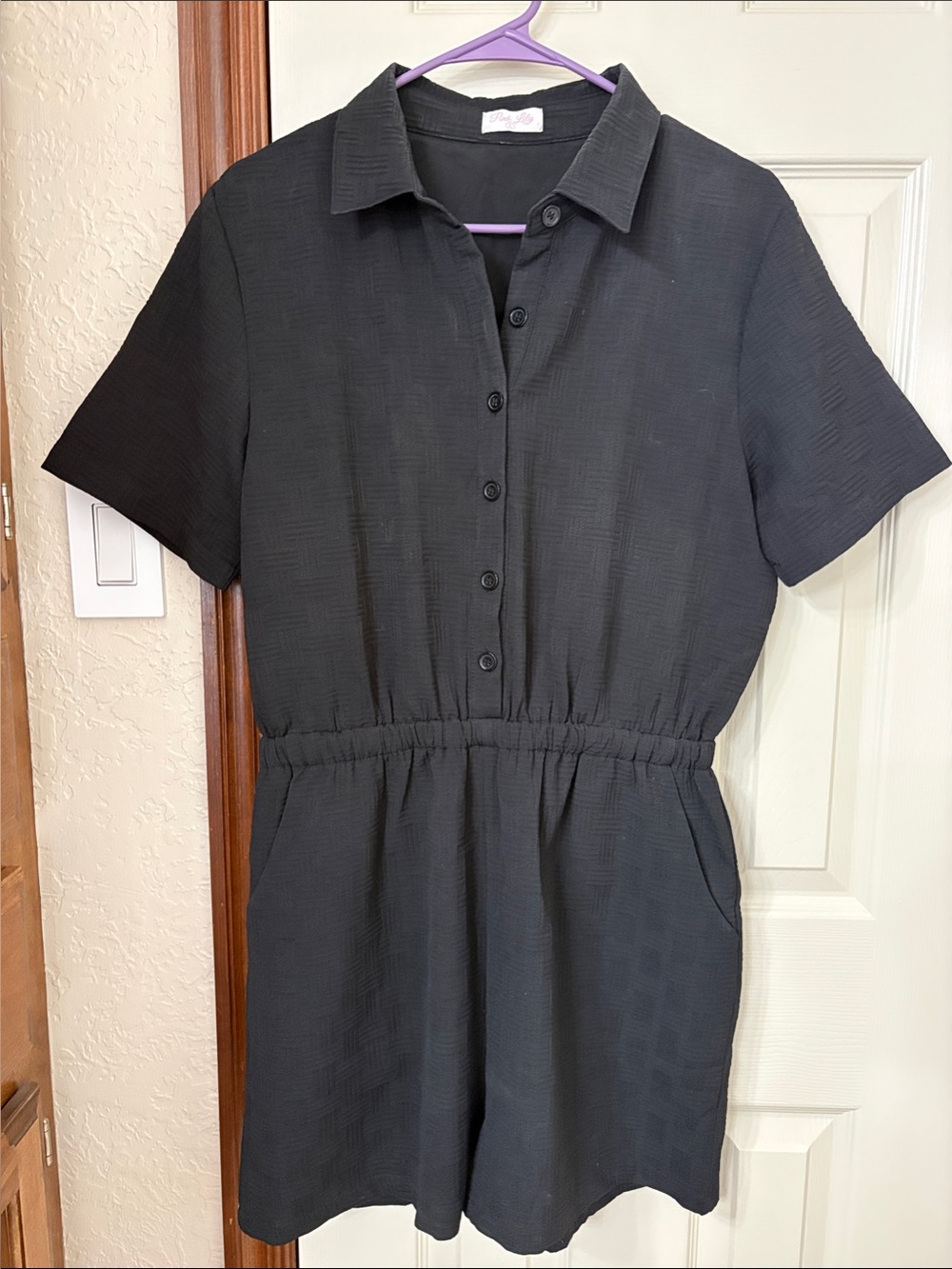 Women’s Black Short-Sleeve Button Romper